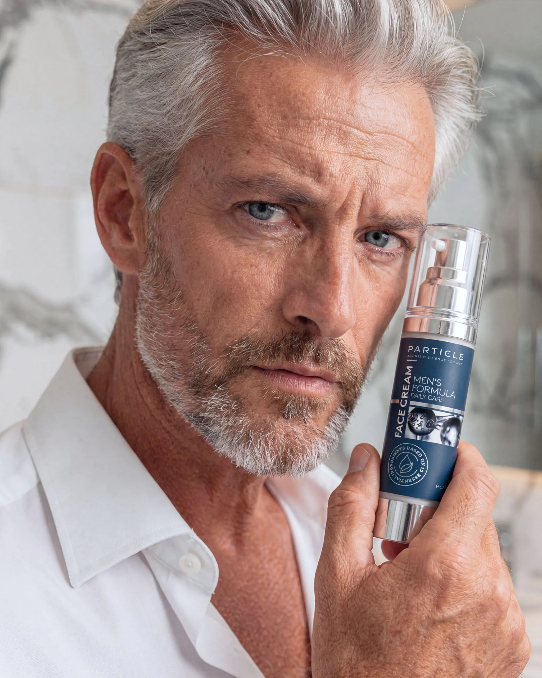 Man holding Particle Face Cream