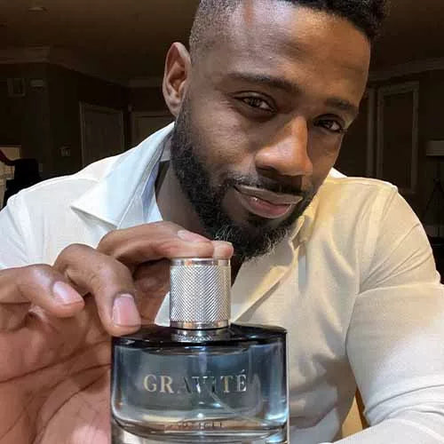 Romaine showing a Gravité fragrance bottle